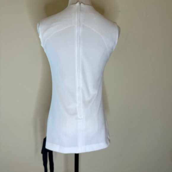 Vintage tunic from the 1960s/70s w/adorable girl applying mascara. Darling Debs - Picture 2 of 5